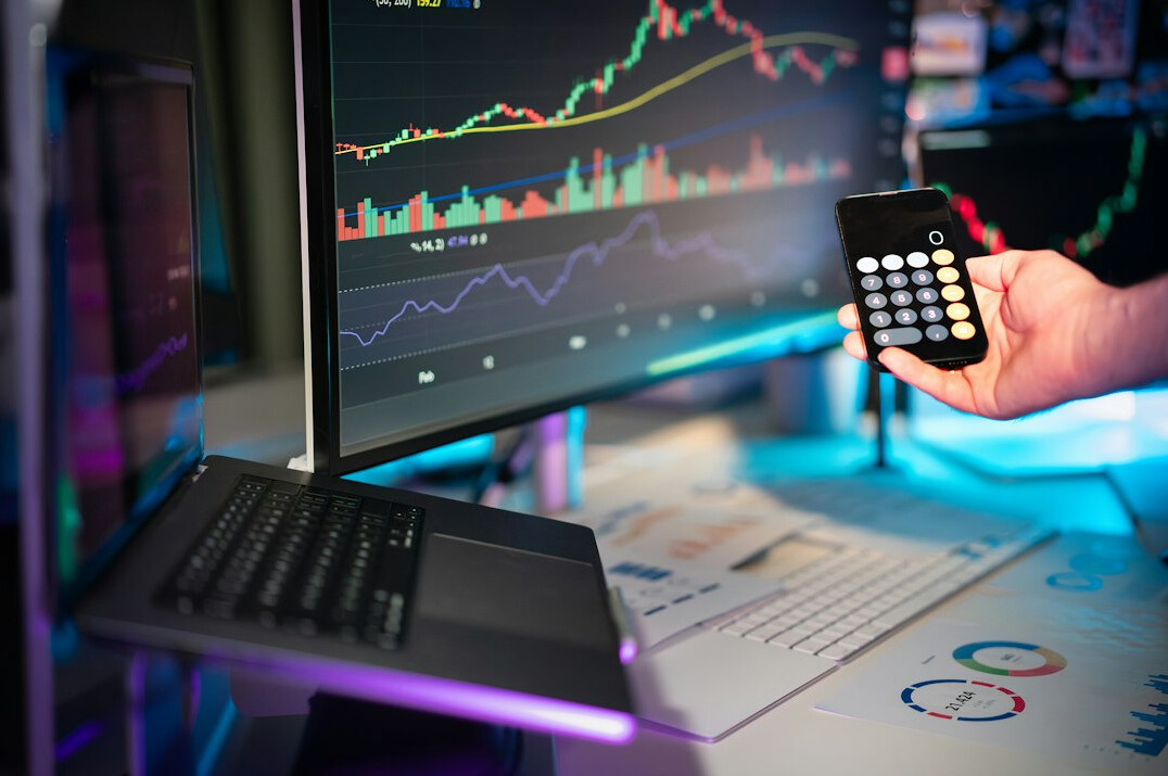 analyst studying charts